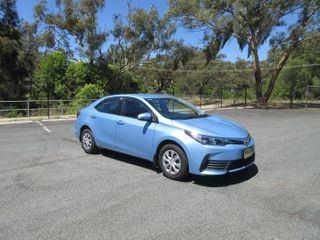 2017  Toyota Corolla Ascent Sedan (Blue Mist) Pre-Owned Car Thumbnail